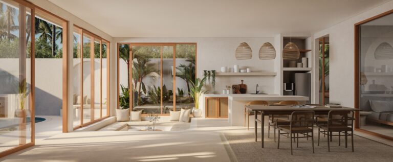 Modern sunlit living room with plants and kitchen