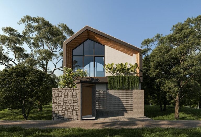 Modern house with large windows and greenery.