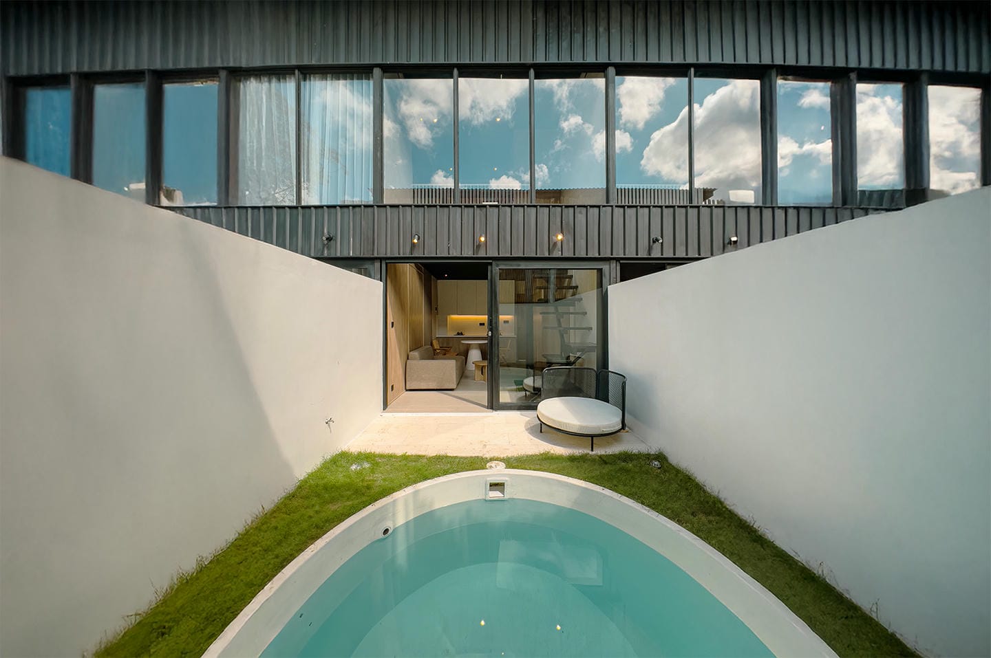 Modern house with pool and glass walls