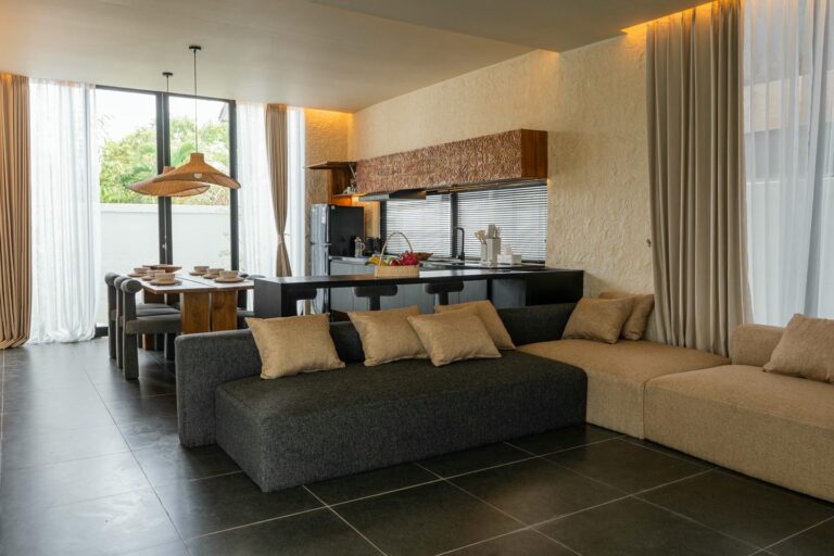 Modern living room and kitchen design with wooden accents