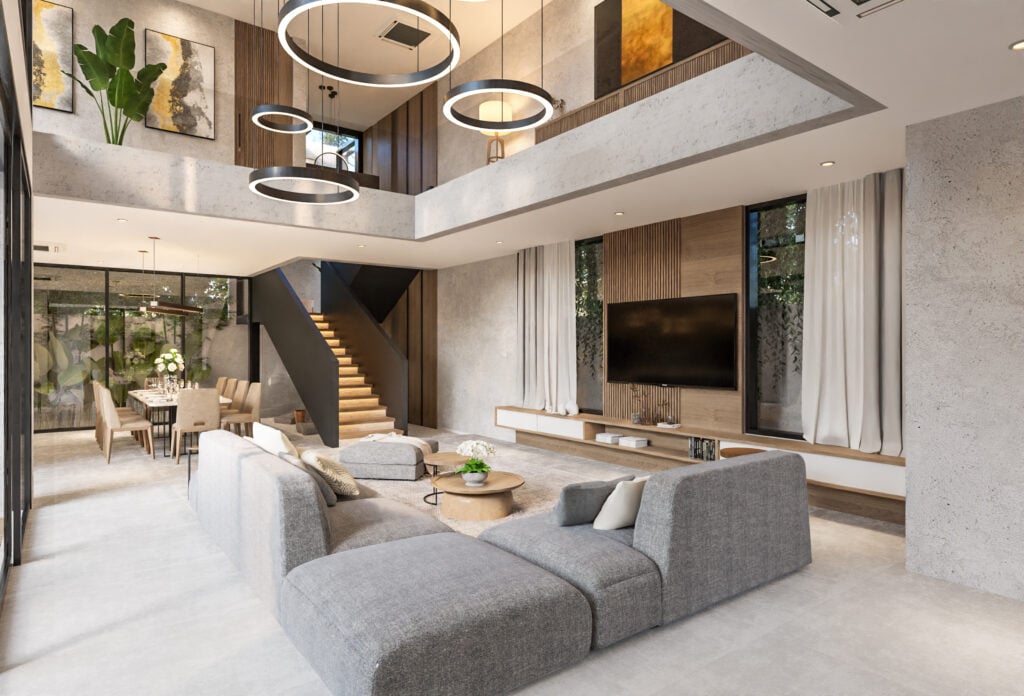 Modern living room with staircase and large windows