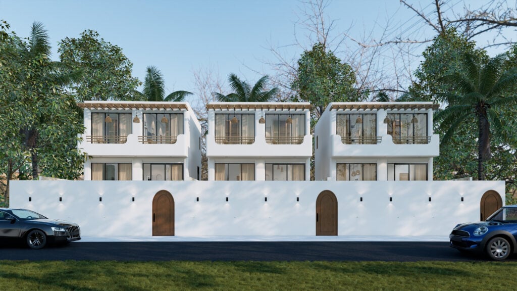 Modern white villas with trees and cars.