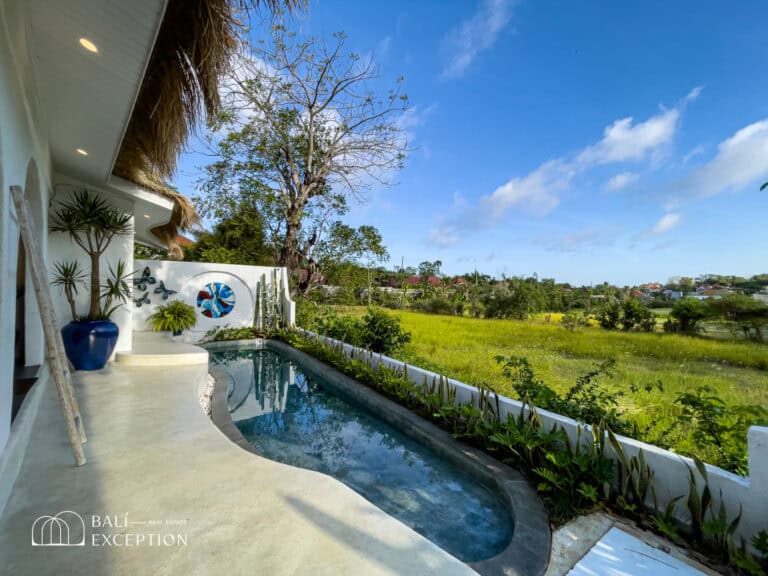 Outdoor pool area with scenic view