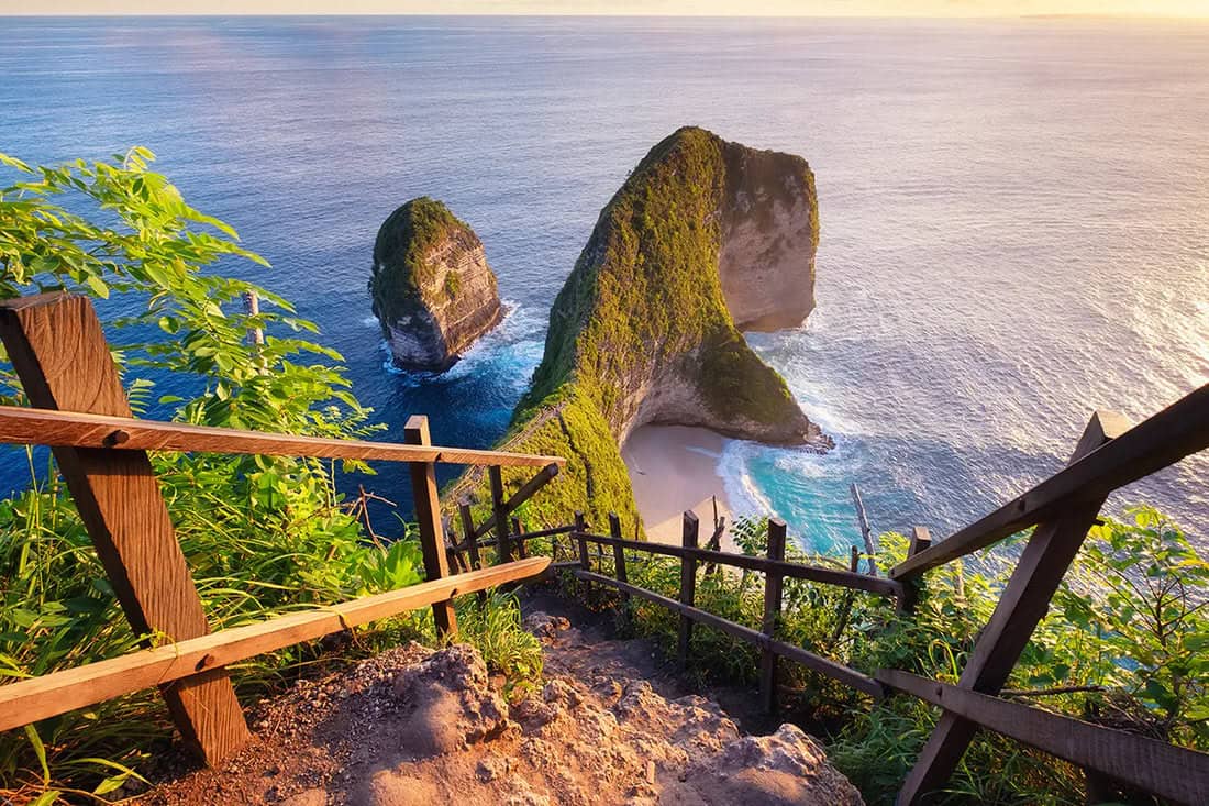 Pathway overlooking ocean and rock formations