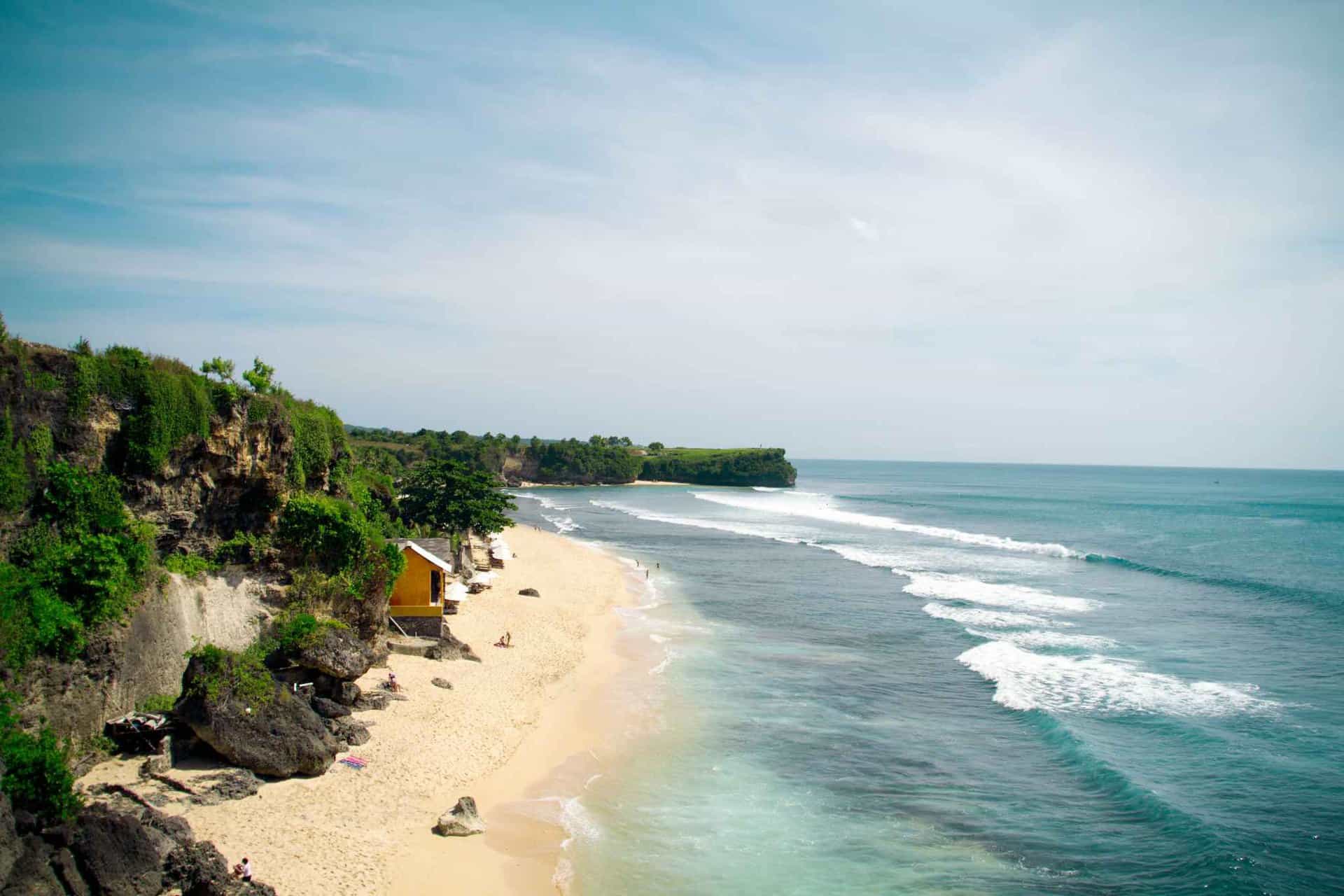 Scenic beach with cliffs and waves