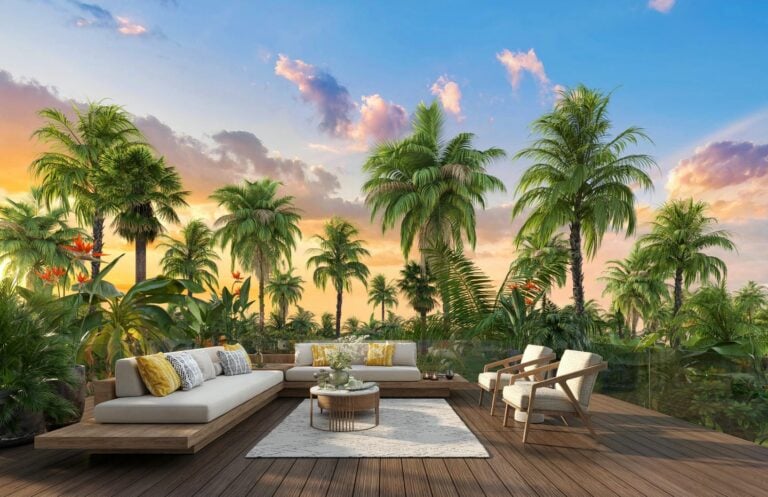 Tropical outdoor lounge with palm trees and sunset.