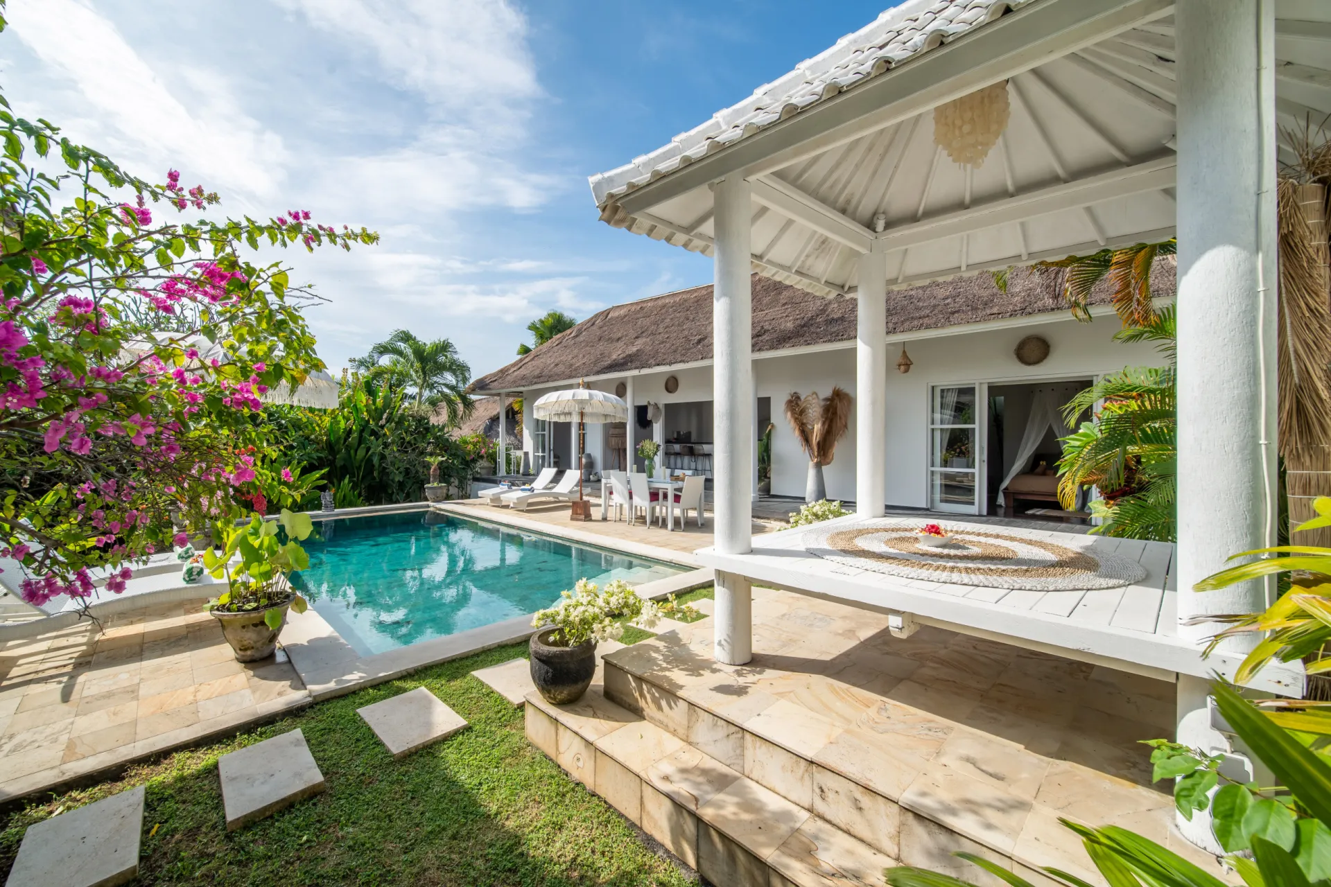 Spacious tropical villa with pool and garden.