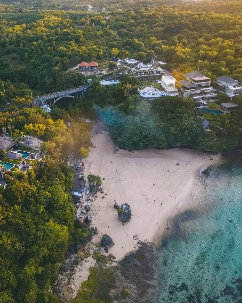 Aerial view of beach and lush green landscape