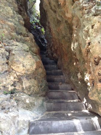 Stone stairs between rocky walls