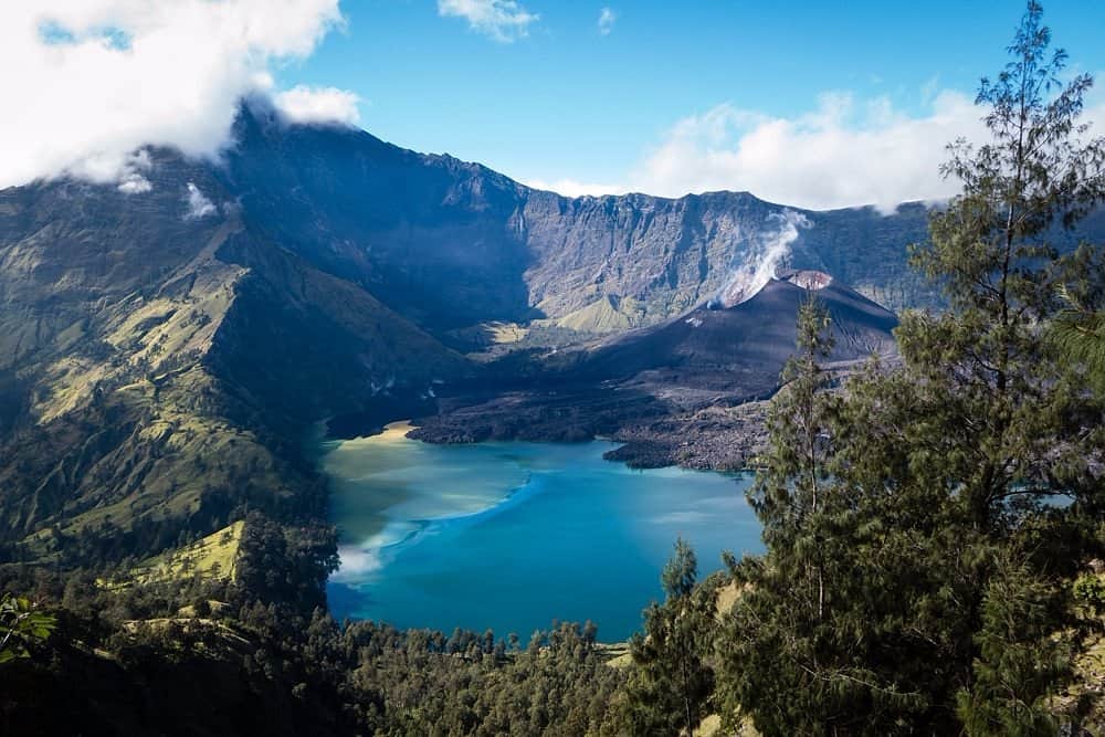 Scenic view of volcanic lake and mountains