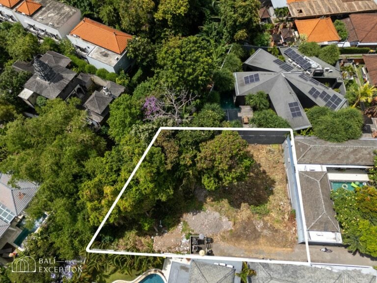 Aerial view of residential land and surrounding buildings.