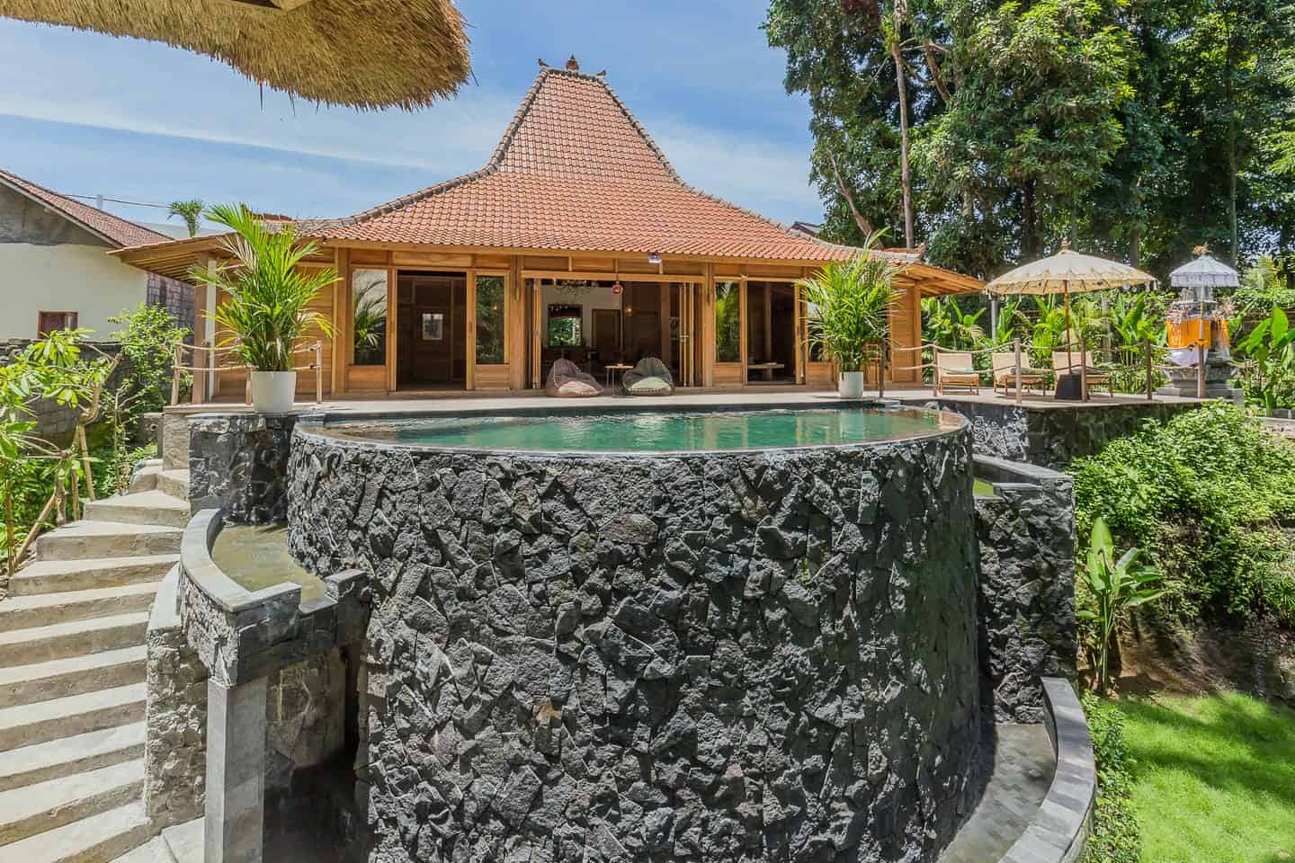 Tropical villa with patio and elevated pool