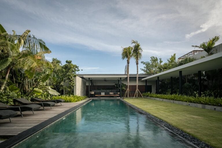 Modern house with pool and lush garden