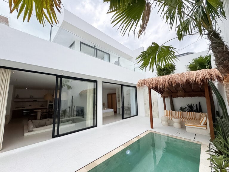 Modern villa with pool and outdoor seating area