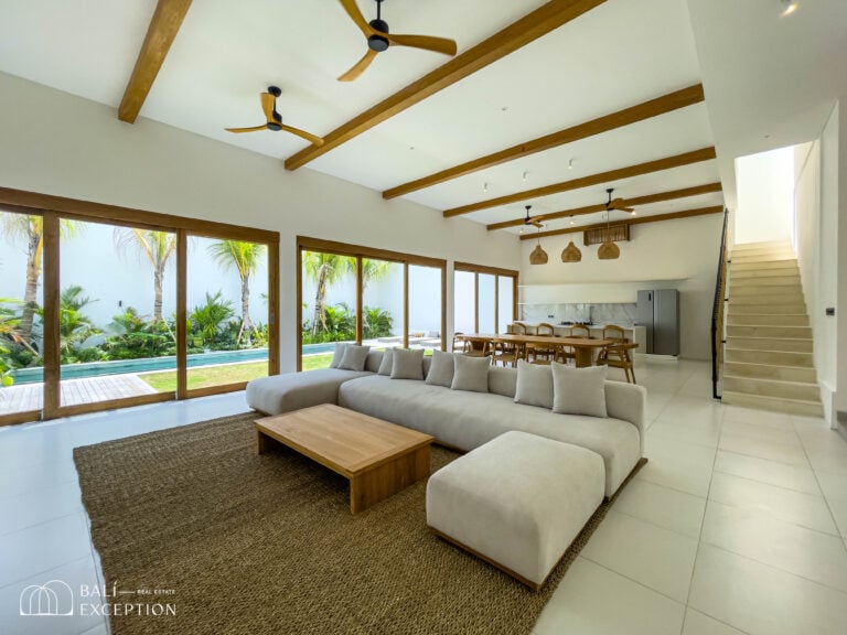 Spacious modern living room with garden view.