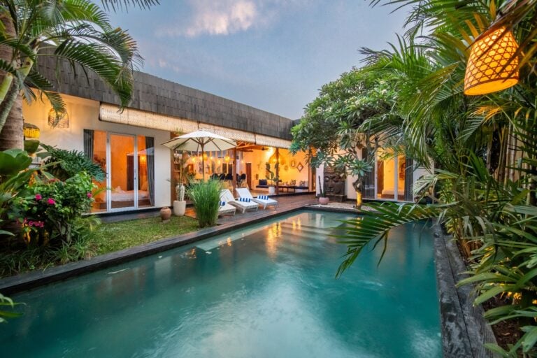 Tropical villa with pool and lush garden