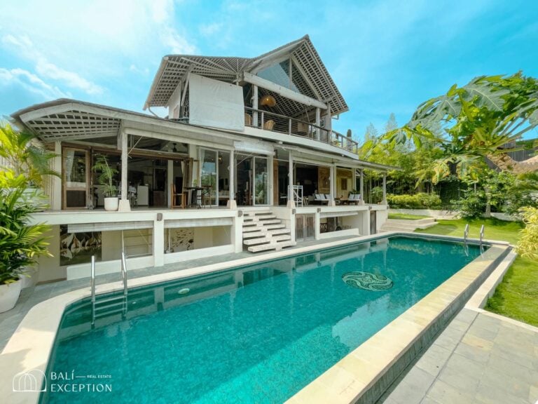 Luxury villa with pool and garden view.