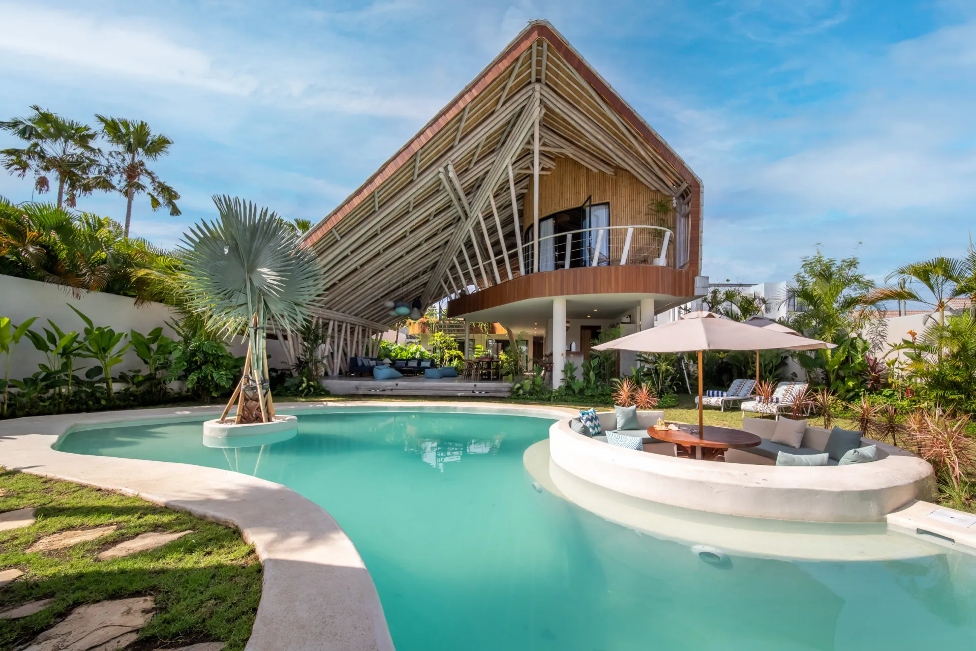 Modern villa with pool and tropical garden