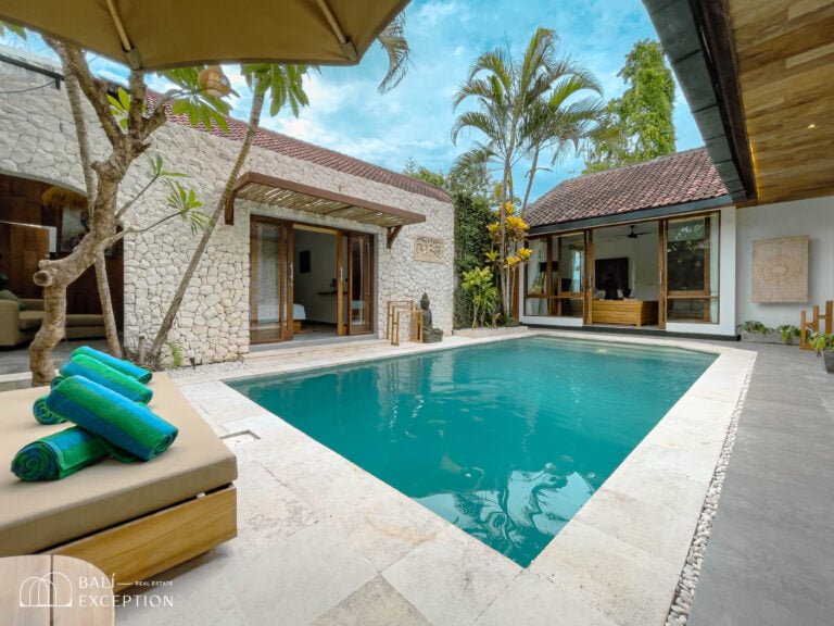 Luxury villa with private pool and tropical decor.