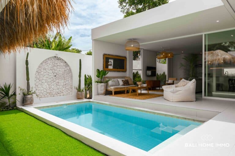 Modern outdoor lounge with pool and plants