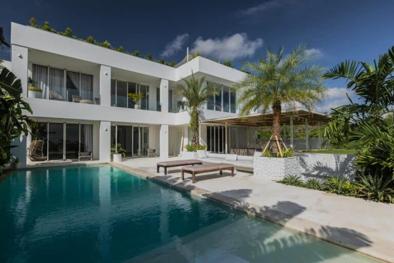 Modern villa with pool and palm trees