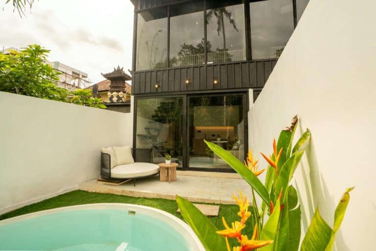 Modern villa courtyard with small pool and plants