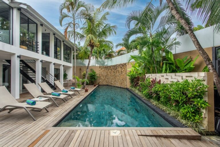 Modern villa with pool and tropical garden