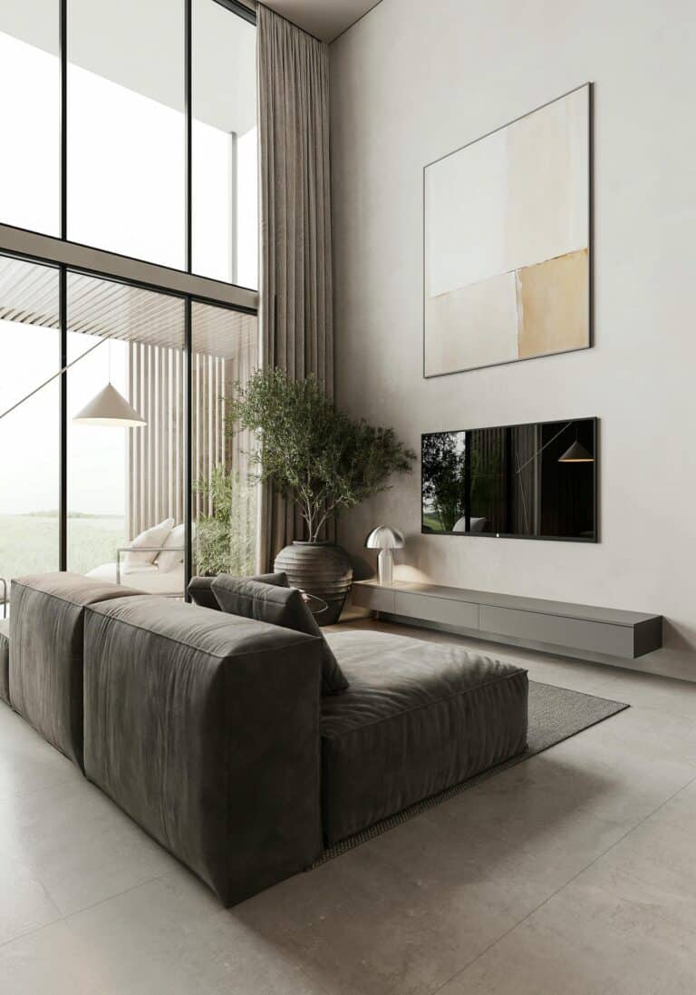 Modern living room with large windows and minimalist decor.