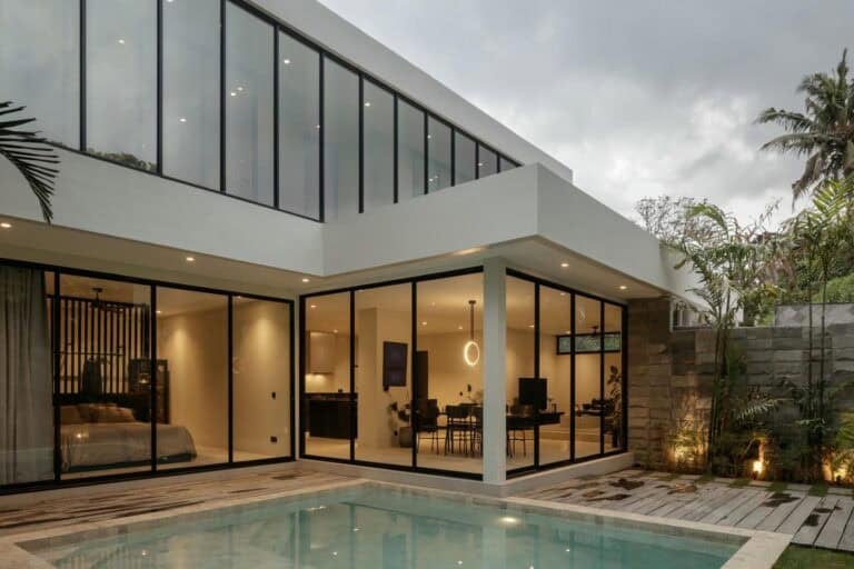 Modern house with large windows and pool