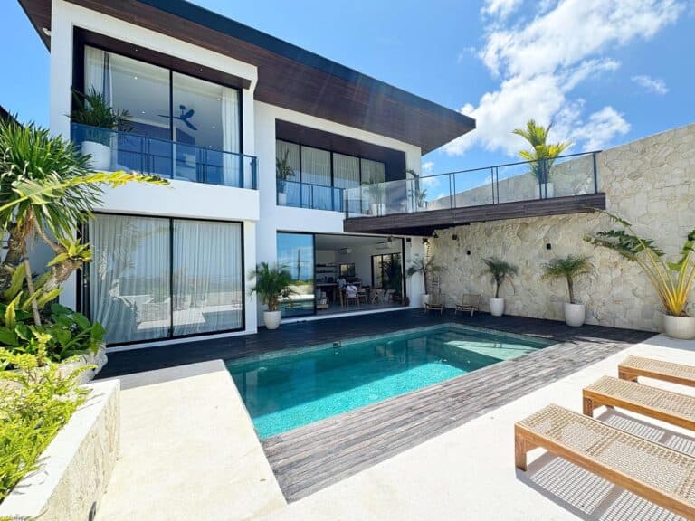 Modern house with pool and patio.