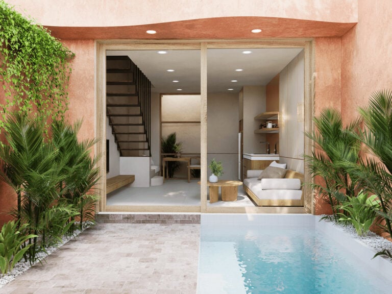 Modern home with pool and glass doors.