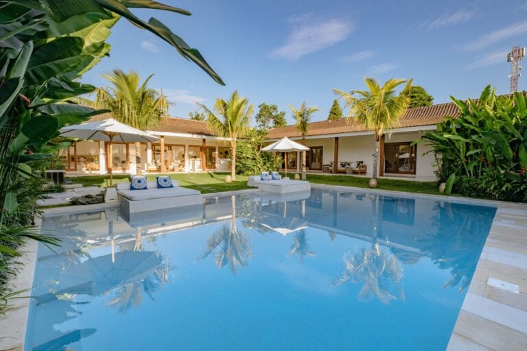 Luxury villa with pool and tropical garden.