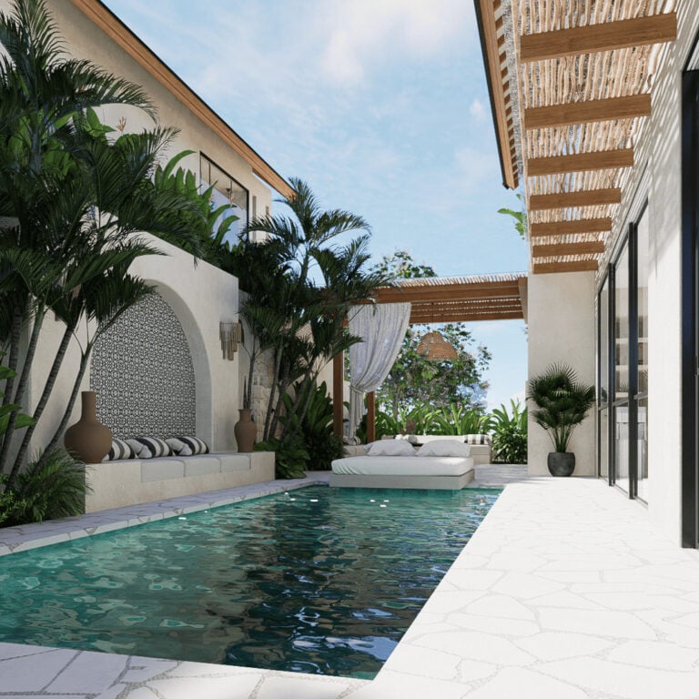 Luxurious villa courtyard with pool and lush plants.