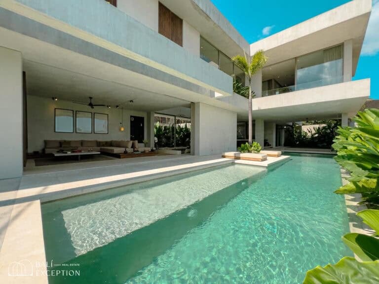 Modern villa with pool and tropical plants