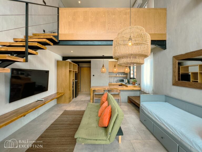 Modern loft interior with wooden staircase and furniture.
