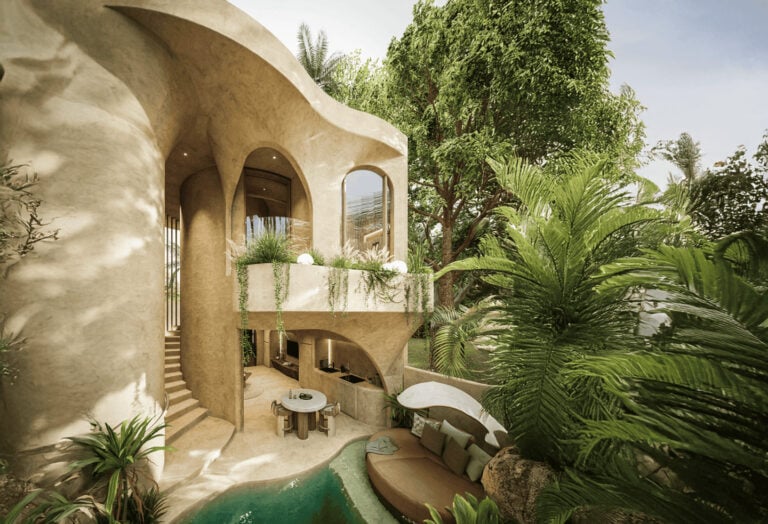 Modern villa with pool and lush greenery.