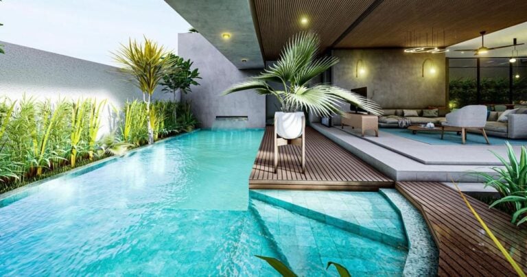 Modern outdoor patio with pool and plants.