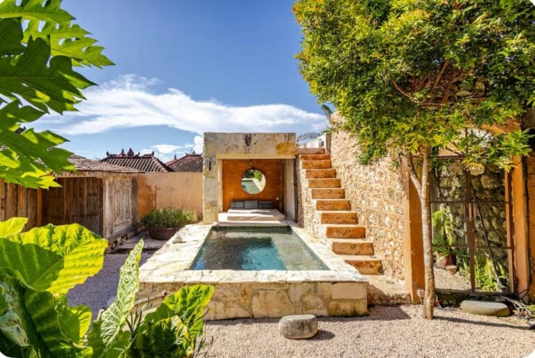 Stone pool with stairs and plants