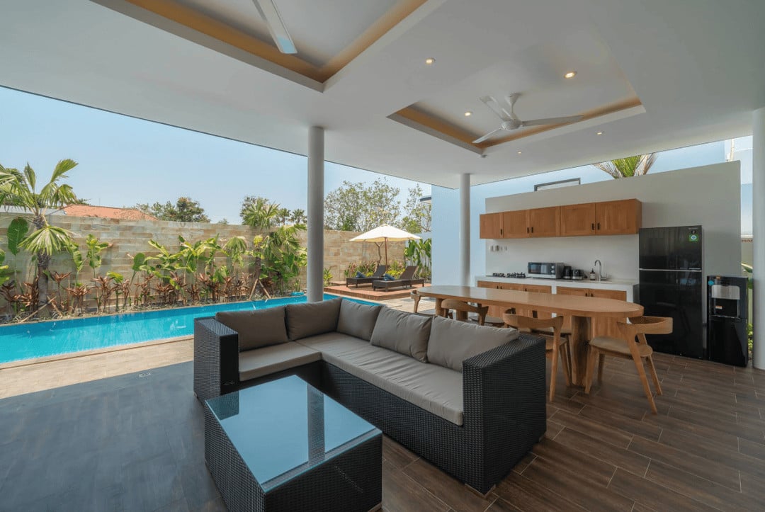 Modern patio with pool and outdoor kitchen