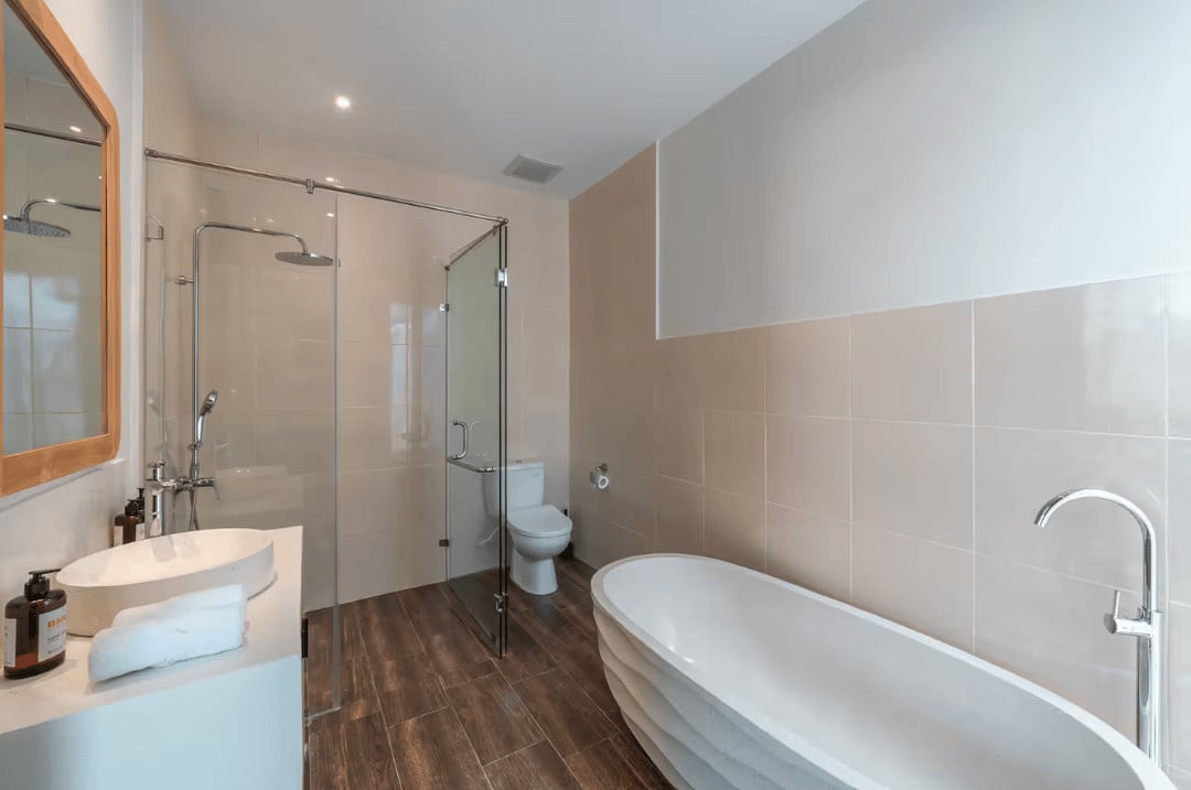 Modern bathroom with tub and shower