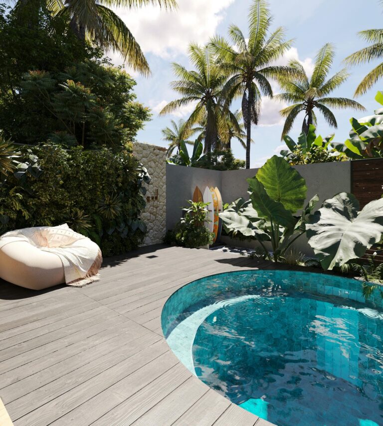 Tropical backyard with pool, palm trees, and surfboards.